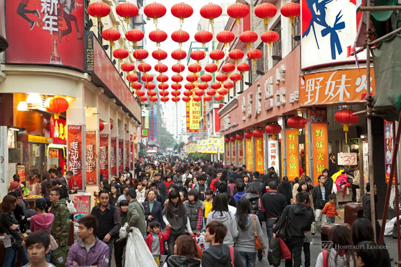 SHENZHEN, CHINA-JAN 27: Shoppers and visitors crowd the famous Dongmen Pedestrian Street on Jan 27, 2011 in Shenzhen, China, ahead of the upcoming Chinese New Year, the year of the rabbit