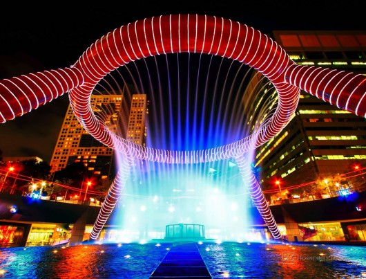 Fountain of Wealth in dusk , landmark of Singapore night