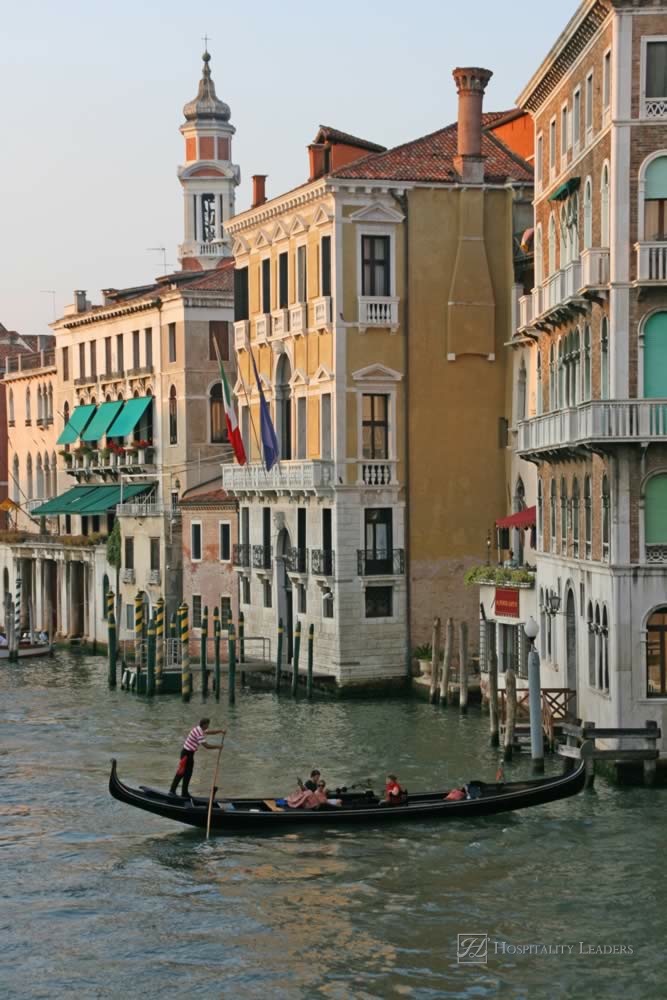 Canal of Venice with houses and gondola, Italy, Europe