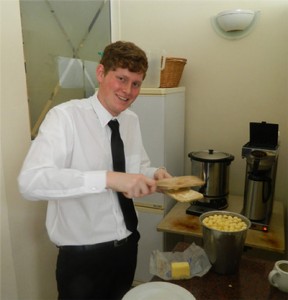 Adriaan helping in the breakfast buffet