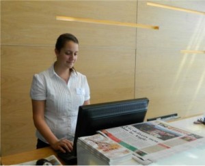 Mon? behind the Reception desk