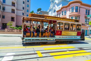 Hospitality News: San Francisco - June 20: Famous Cable Car Bus near Fisherman's Wharf on June 20, 2012 in San Francisco, California. Cable car trains first began operating in the city in 1873