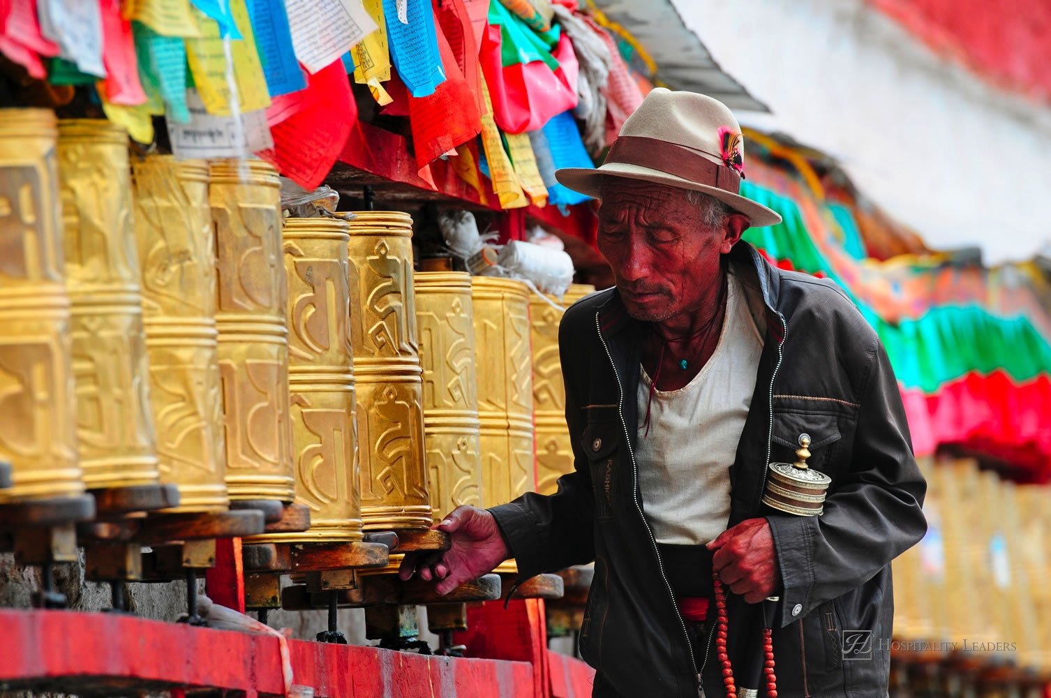 Lhasa, China - February 22: Unidentified Tibetan pilgrim circles the Potala palace during Tibetan New Year on February 22, 2012 in Lhasa, China. Devotees walk 3 times around the Potala for good luck