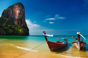 Hospitality News: Tropical beach, traditional long tail boats, Andaman Sea, Thailand