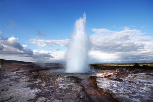 Eruption of Stokkur geyser - famous natural touristic attraction of Iceland in Geysir area